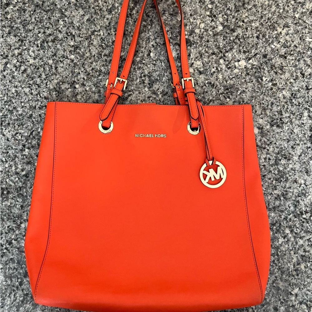 MK tote, bright orange, tan interior 13.5”x13.5”x4”. Strap drop 10”